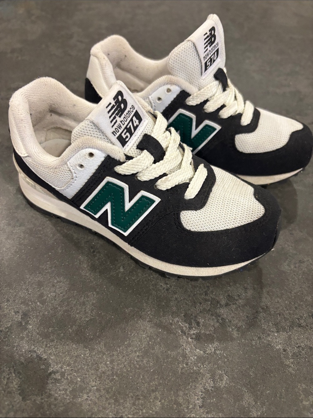 New Balance Kids Black White Sneakers with Green 'N' Logo